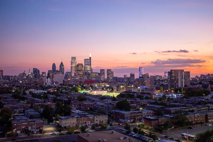 Philadelphia with a purple skyline.